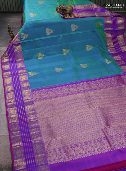 Pure kanchipuram silk saree dual shade of bluish green and purple with zari woven buttas and long zari woven border