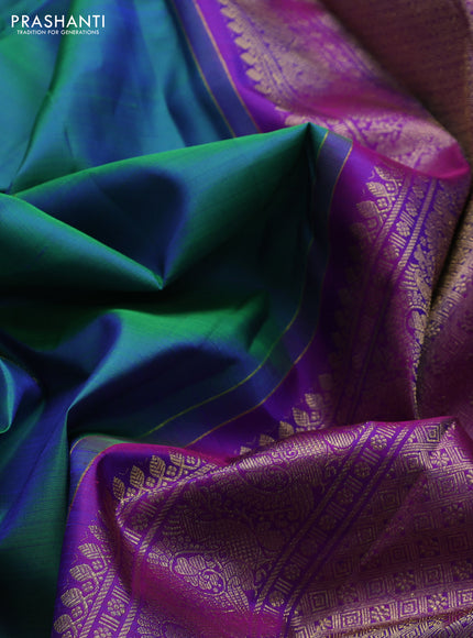 Pure kanchipuram silk saree dual shade of bluish green and purple with zari woven buttas and long zari woven border