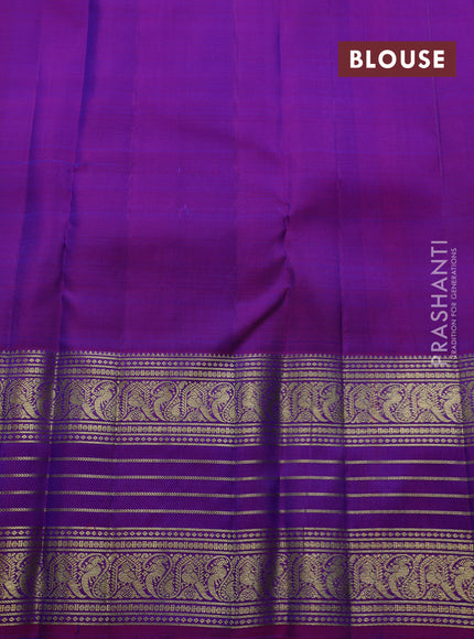 Pure kanchipuram silk saree dual shade of bluish green and purple with zari woven buttas and long zari woven border