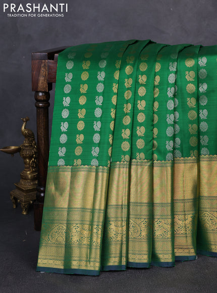Pure kanchipuram silk saree green with allover silver zari woven buttas and long rich zari woven border