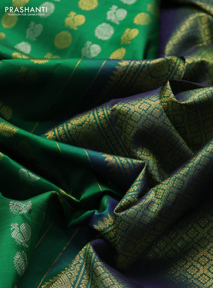 Pure kanchipuram silk saree green with allover silver zari woven buttas and long rich zari woven border
