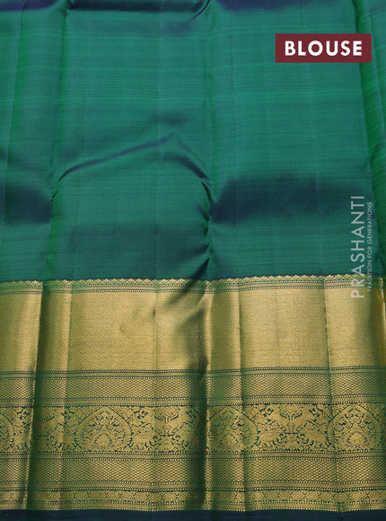 Pure kanchipuram silk saree green with allover silver zari woven buttas and long rich zari woven border