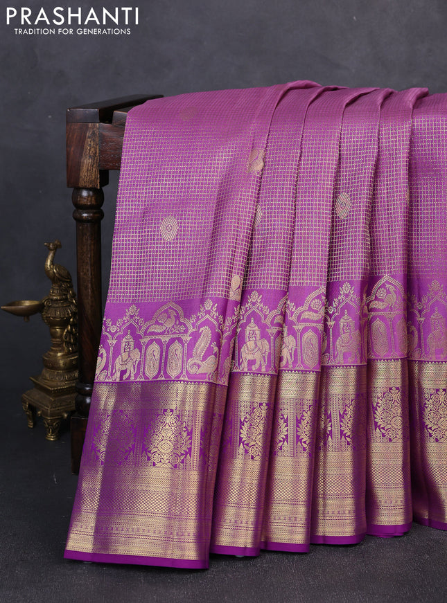 Pure kanchipuram silk saree mild purple shade and purple with allover zari checks & buttas and long zari woven border