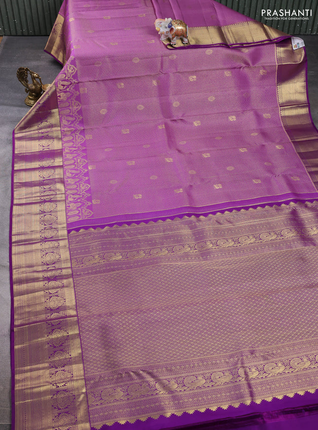 Pure kanchipuram silk saree mild purple shade and purple with allover zari checks & buttas and long zari woven border