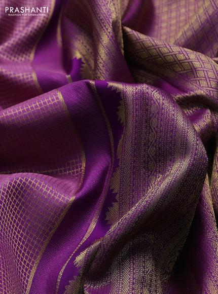 Pure kanchipuram silk saree mild purple shade and purple with allover zari checks & buttas and long zari woven border