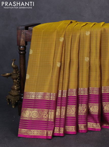 Pure kanchipuram silk saree mustard green and magenta pink with allover zari checks & buttas and long zari woven border