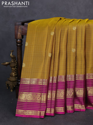 Pure kanchipuram silk saree mustard green and magenta pink with allover zari checks & buttas and long zari woven border
