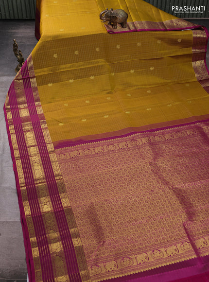 Pure kanchipuram silk saree mustard green and magenta pink with allover zari checks & buttas and long zari woven border