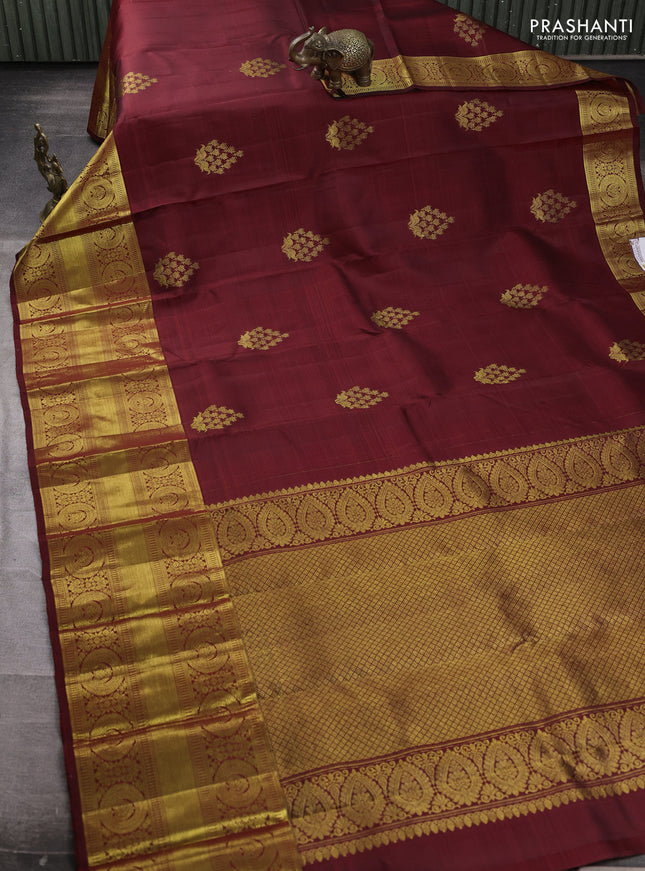 Pure kanchipuram silk saree deep maroon with zari woven buttas and long zari woven border