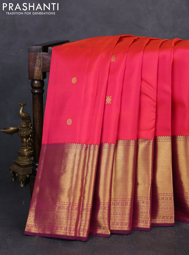 Pure kanchipuram silk saree dual shade of pinkish orange and magenta pink with zari woven buttas and long zari woven border