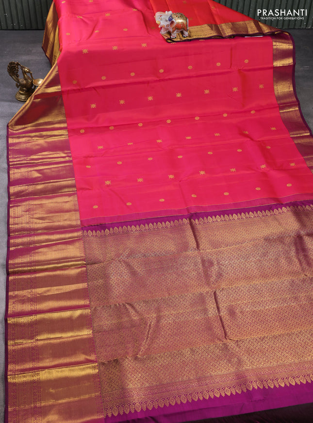 Pure kanchipuram silk saree dual shade of pinkish orange and magenta pink with zari woven buttas and long zari woven border