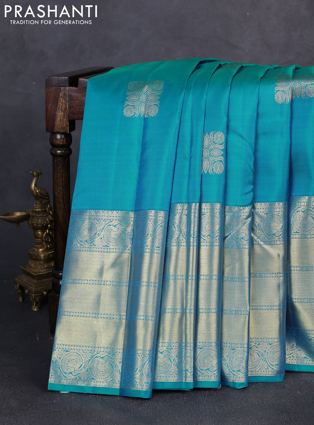 Pure kanchipuram silk saree teal blue with zari woven buttas and long zari woven border