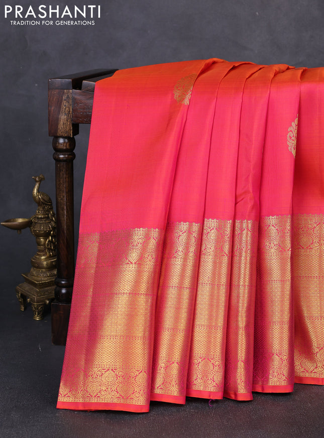 Pure kanchipuram silk saree dual shade of pinkish orange with zari woven buttas and long zari woven border