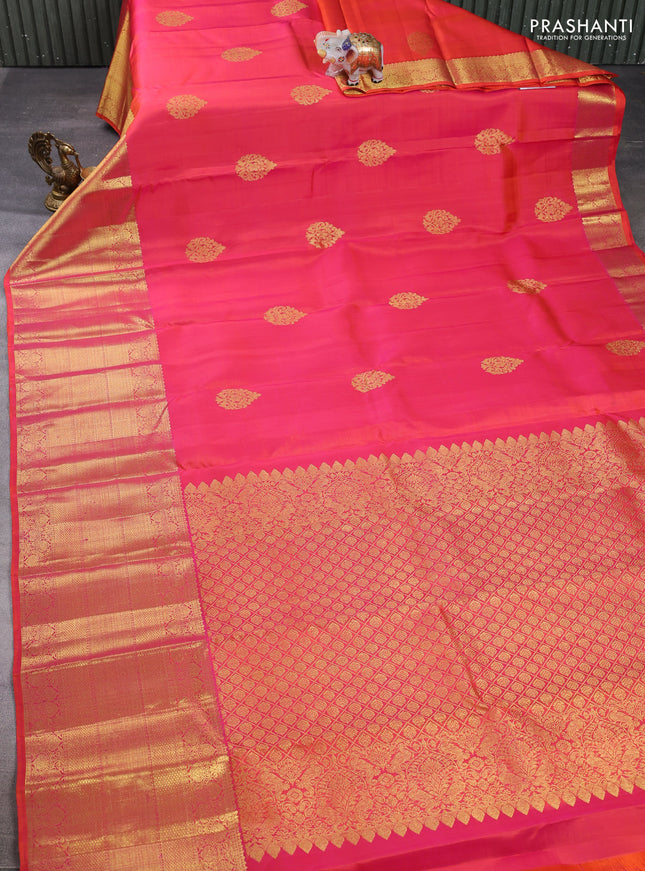 Pure kanchipuram silk saree dual shade of pinkish orange with zari woven buttas and long zari woven border