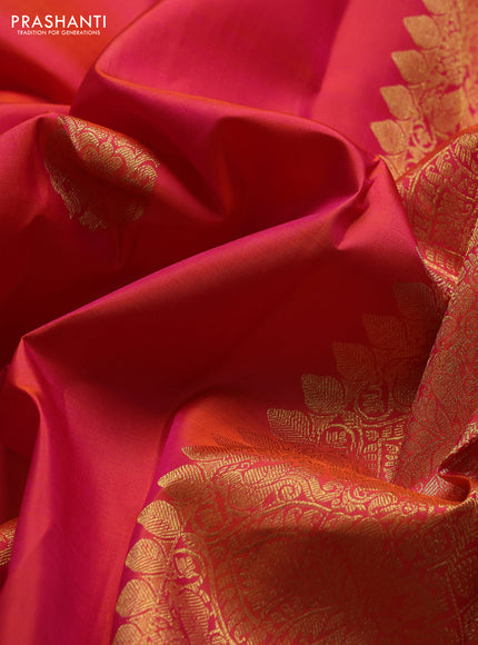 Pure kanchipuram silk saree dual shade of pinkish orange with zari woven buttas and long zari woven border