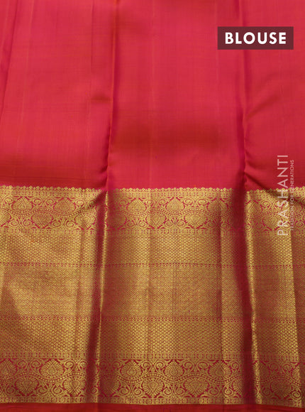 Pure kanchipuram silk saree dual shade of pinkish orange with zari woven buttas and long zari woven border