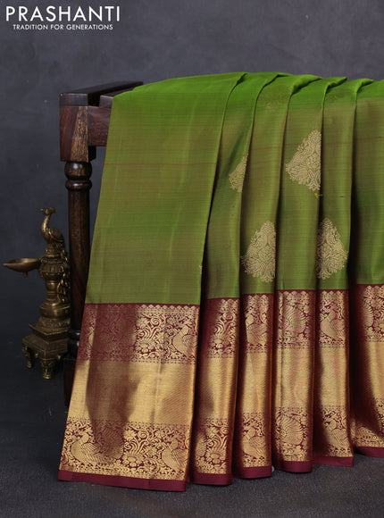 Pure kanchipuram silk saree green and coffe brown with zari woven buttas and long rich zari woven border