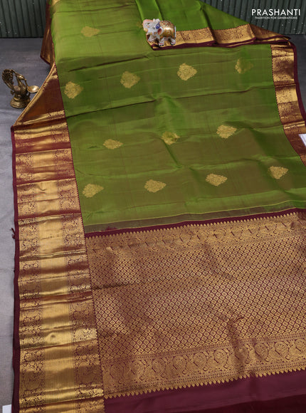 Pure kanchipuram silk saree green and coffe brown with zari woven buttas and long rich zari woven border