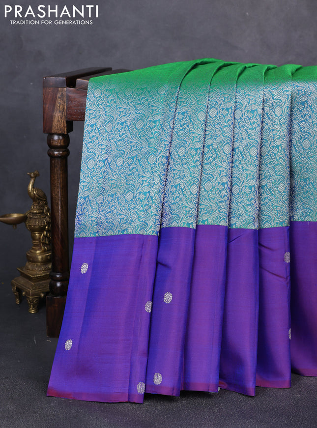 Pure kanchipuram silk saree teal green and blue with allover silver zari brocade weaves and silver zari woven butta border