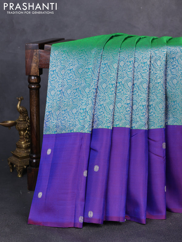 Pure kanchipuram silk saree teal green and blue with allover silver zari brocade weaves and silver zari woven butta border