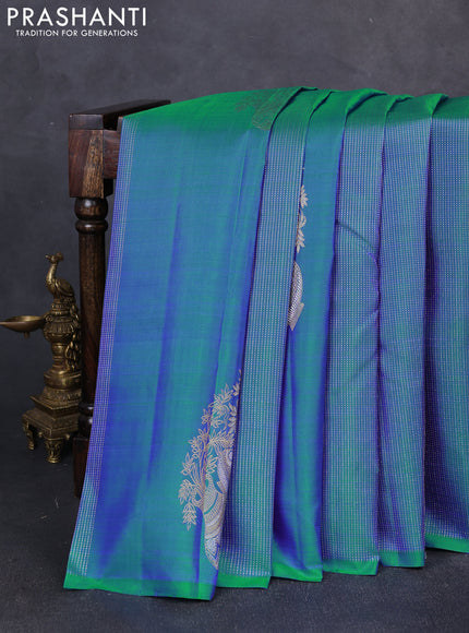 Pure kanchipuram silk saree dual shade of bluish green and purple with allover zari weaves & buttas in borderless style