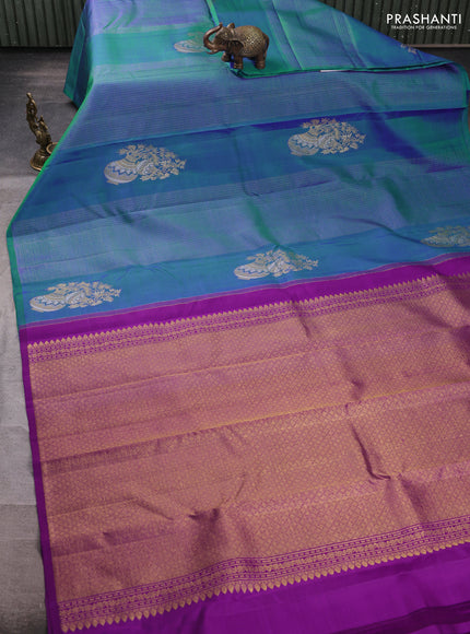 Pure kanchipuram silk saree dual shade of bluish green and purple with allover zari weaves & buttas in borderless style