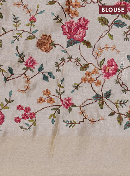 Tissue saree off white with allover zari stripe pattern and embroidery border