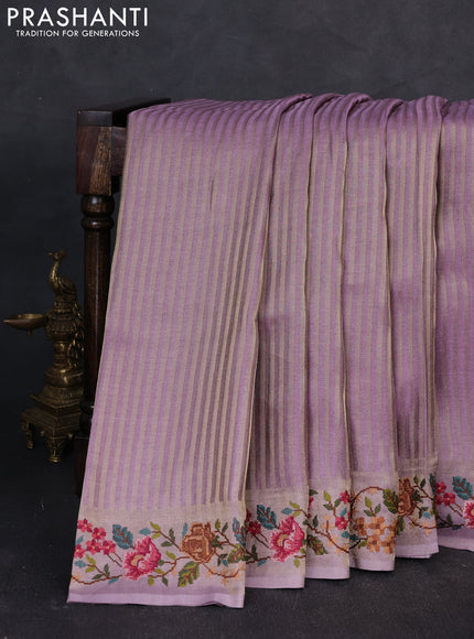 Tissue saree lavender with allover zari stripe pattern and embroidery border