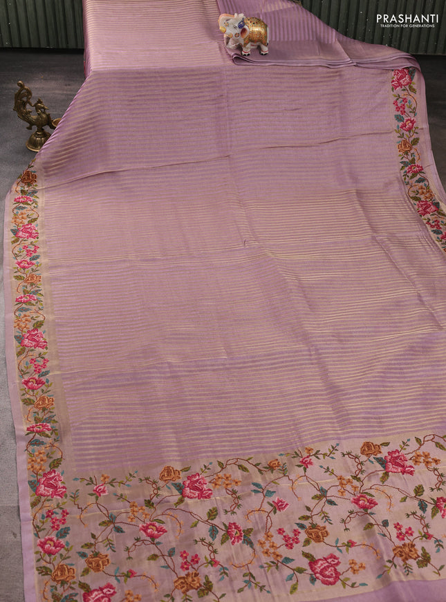 Tissue saree lavender with allover zari stripe pattern and embroidery border