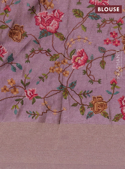 Tissue saree lavender with allover zari stripe pattern and embroidery border