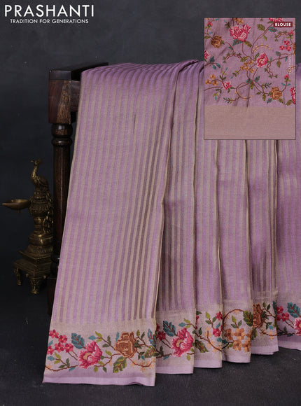 Tissue saree lavender with allover zari stripe pattern and embroidery border