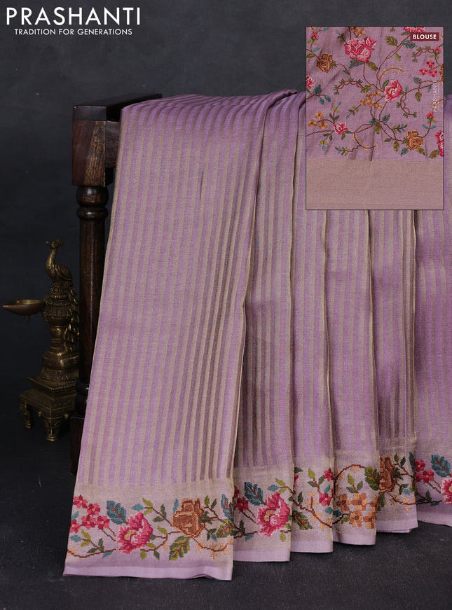 Tissue saree lavender with allover zari stripe pattern and embroidery border