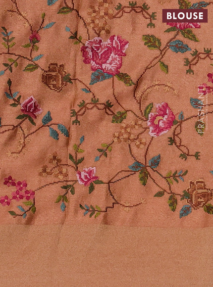 Tissue saree peach with allover zari stripe pattern and embroidery border