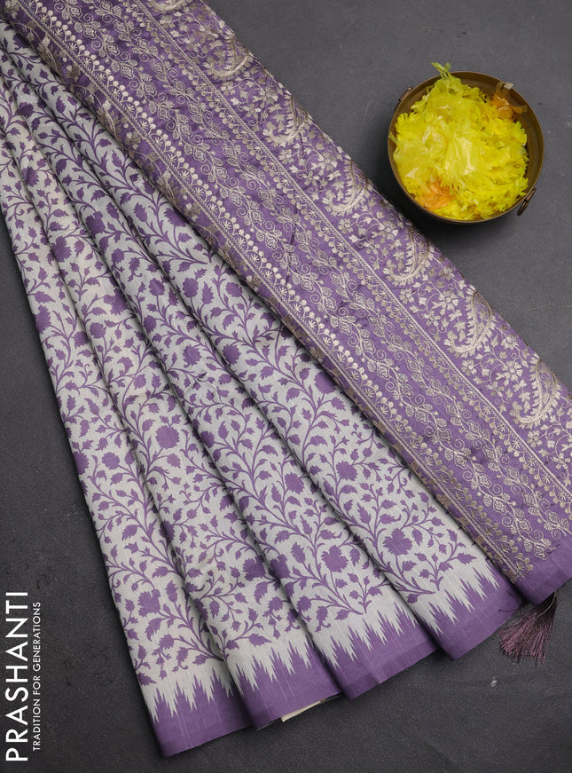 Art tussar saree cream and lavender with allover prints and embroidery pallu