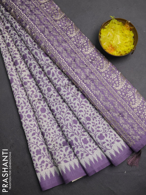Art tussar saree cream and lavender with allover prints and embroidery pallu
