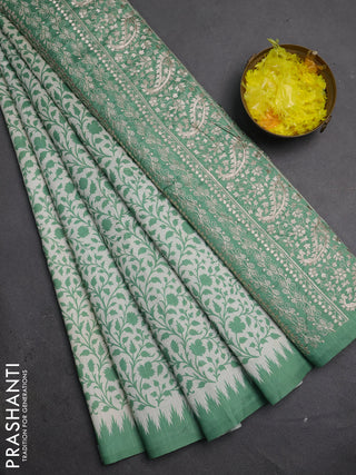 Art tussar saree cream and green with allover prints and embroidery pallu