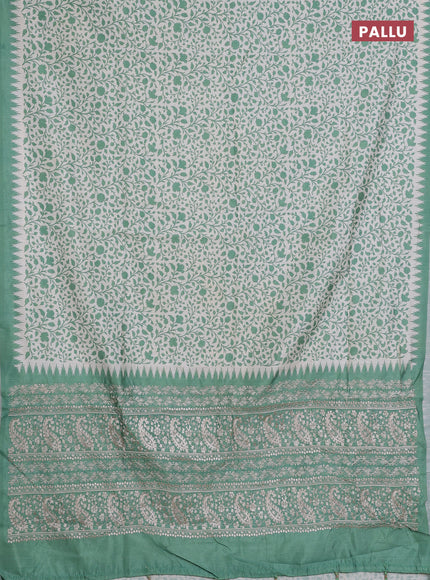 Art tussar saree cream and green with allover prints and embroidery pallu