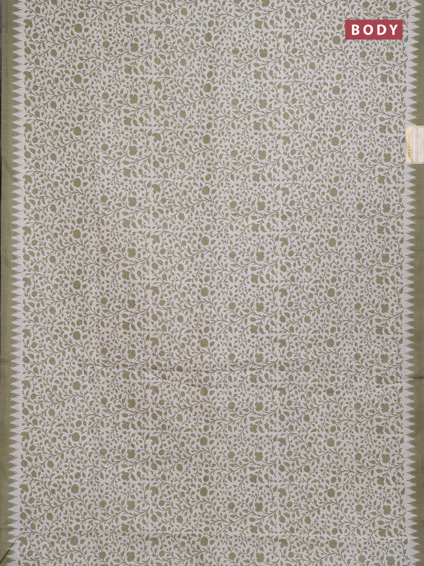 Art tussar saree cream and mehendi green with allover prints and embroidery pallu