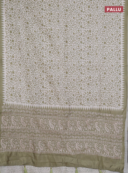 Art tussar saree cream and mehendi green with allover prints and embroidery pallu