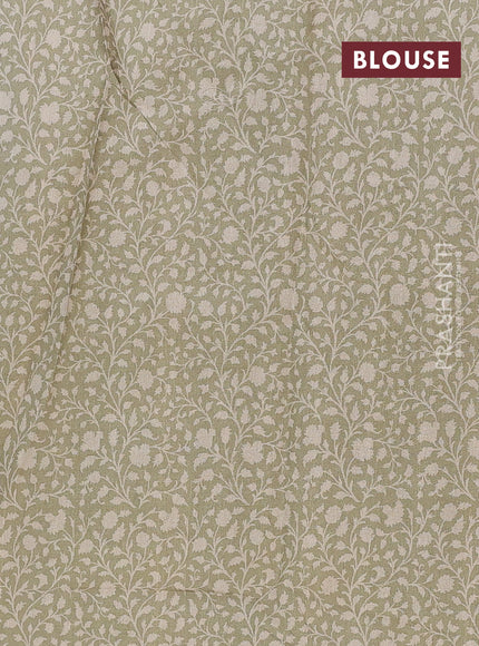 Art tussar saree cream and mehendi green with allover prints and embroidery pallu