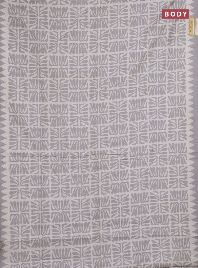 Art tussar saree cream and grey with allover ikat prints and embroidery pallu