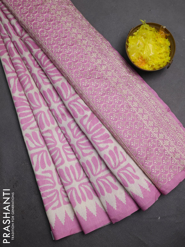 Art tussar saree cream and mauve pink with allover ikat prints and embroidery pallu