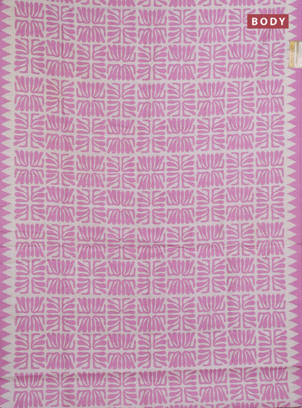 Art tussar saree cream and mauve pink with allover ikat prints and embroidery pallu
