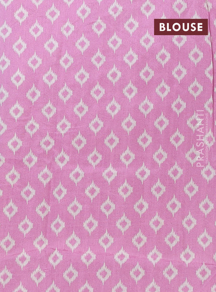 Art tussar saree cream and mauve pink with allover ikat prints and embroidery pallu