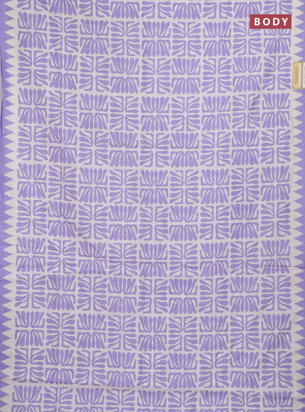 Art tussar saree cream and lavender with allover ikat prints and embroidery pallu