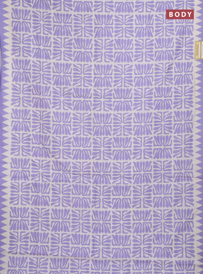 Art tussar saree cream and lavender with allover ikat prints and embroidery pallu