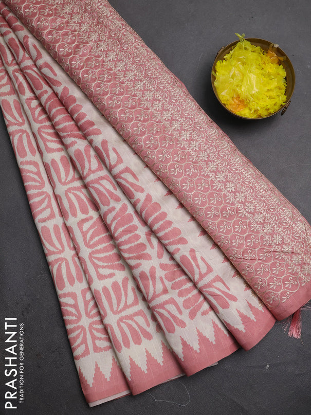 Art tussar saree cream and peach shade with allover ikat prints and embroidery pallu