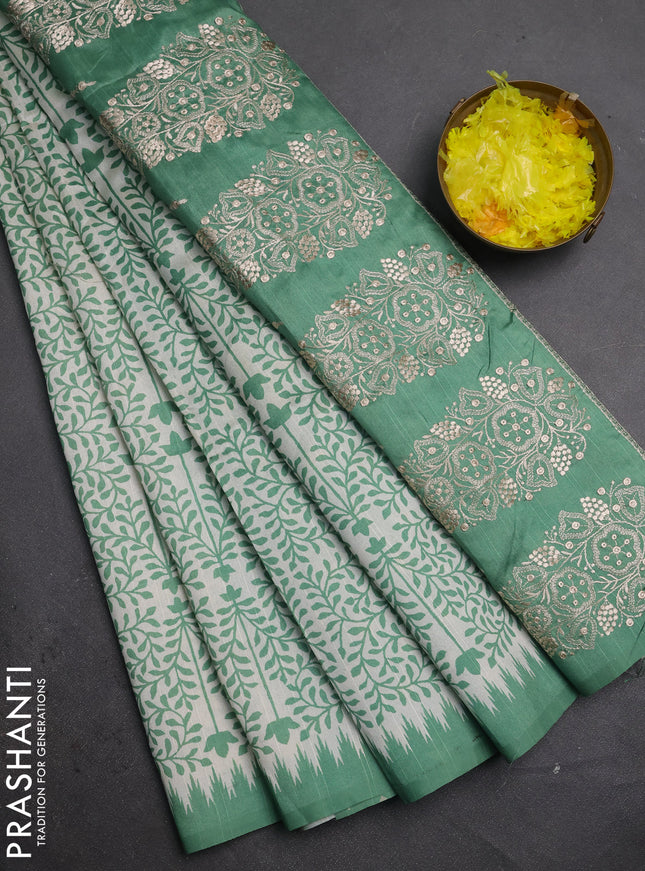 Art tussar saree cream and green with allover prints and embroidery pallu