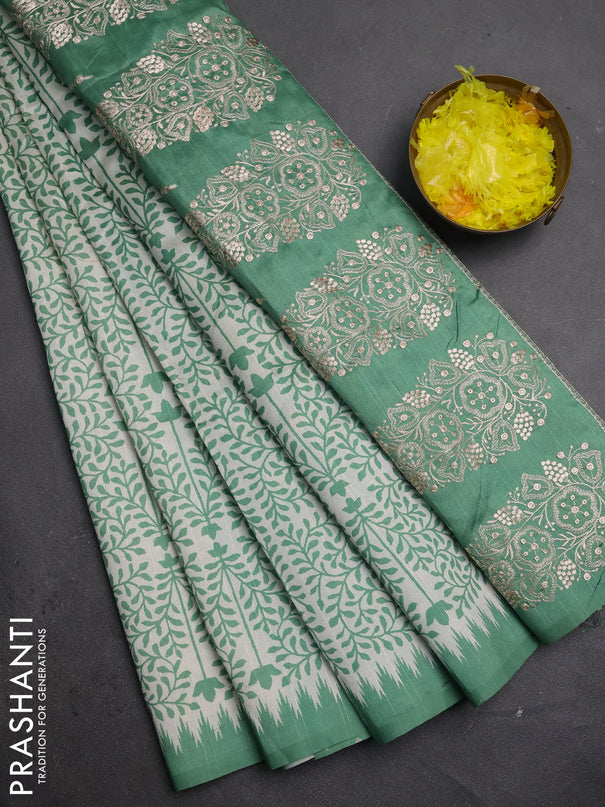 Art tussar saree cream and green with allover prints and embroidery pallu