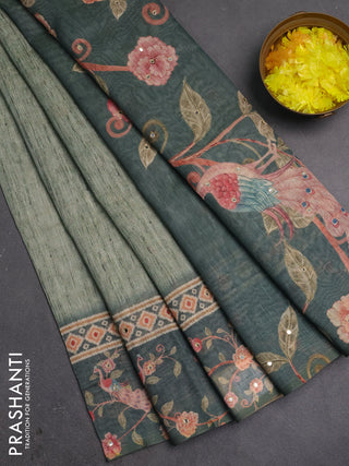 Linen cotton saree green shade and peacock green with plain body and printed mirror work border